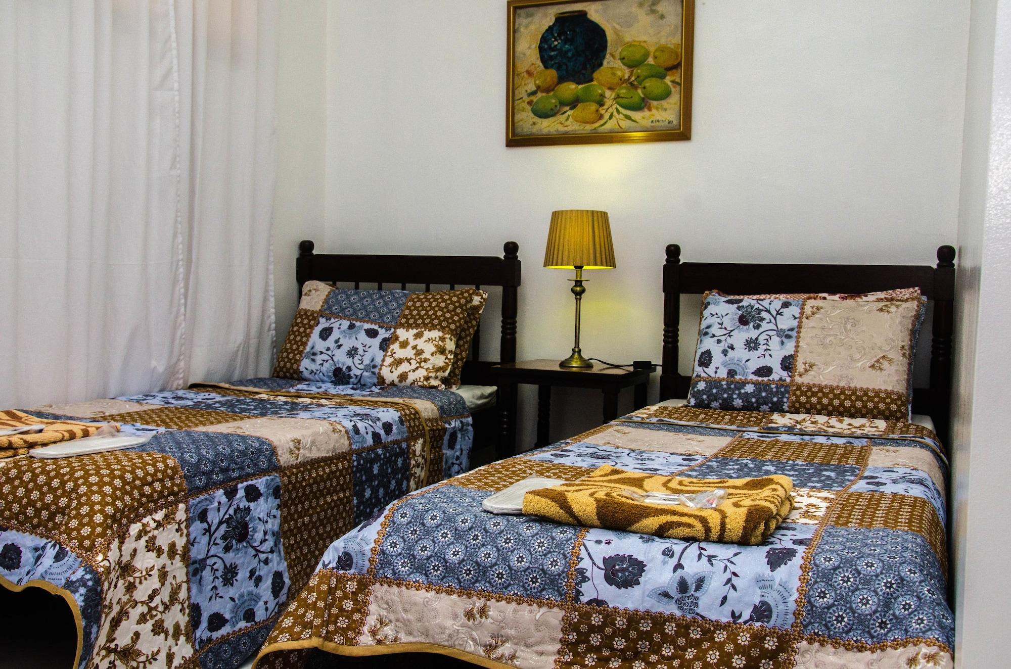 Lola Itang Pension House Tiniguiban Екстер'єр фото