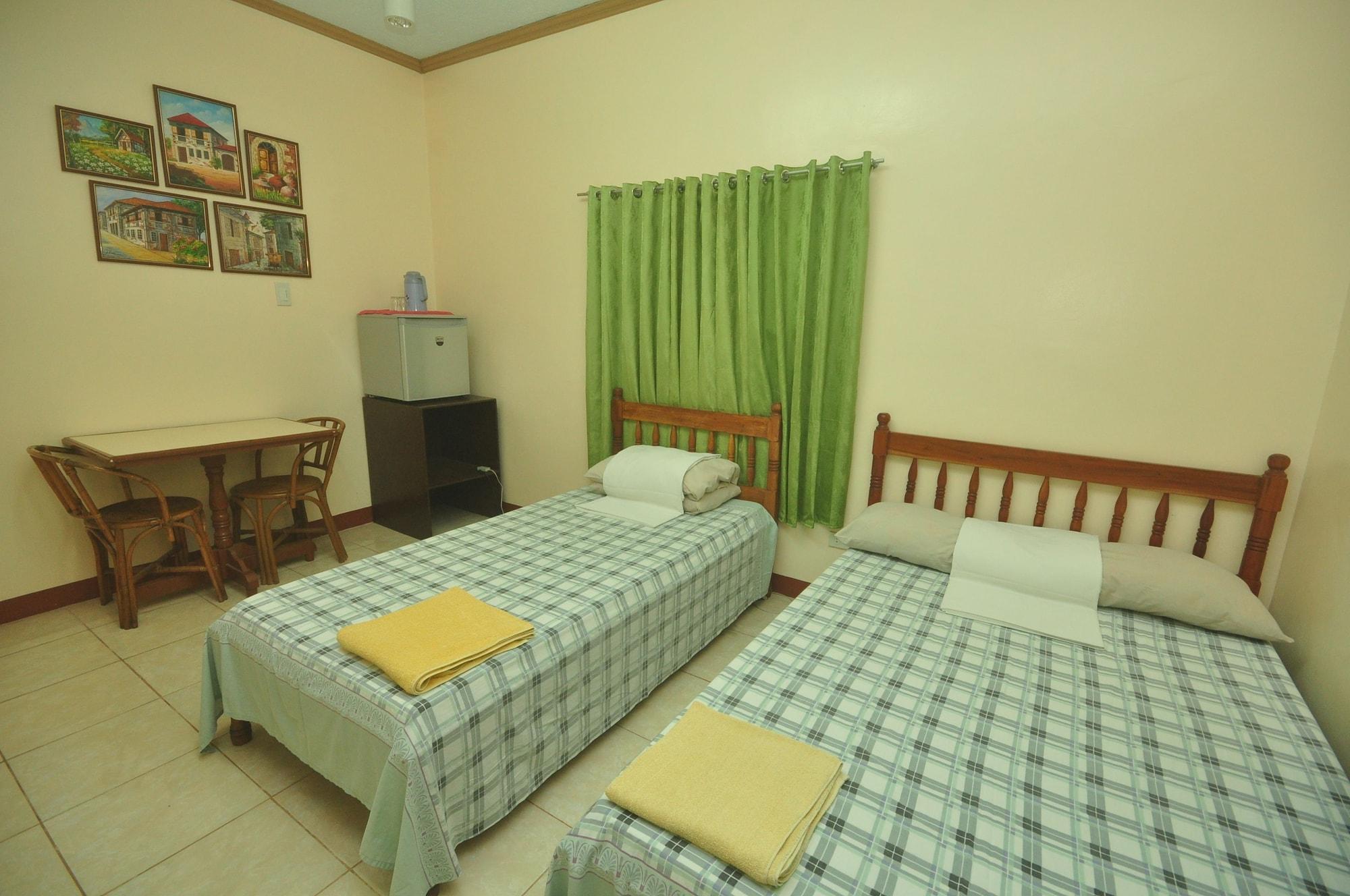 Lola Itang Pension House Tiniguiban Екстер'єр фото