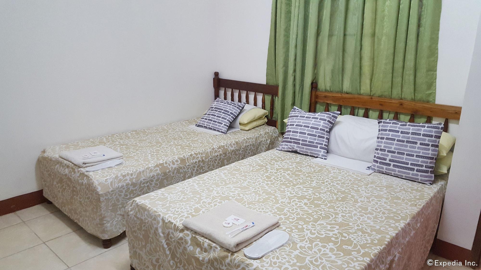 Lola Itang Pension House Tiniguiban Екстер'єр фото