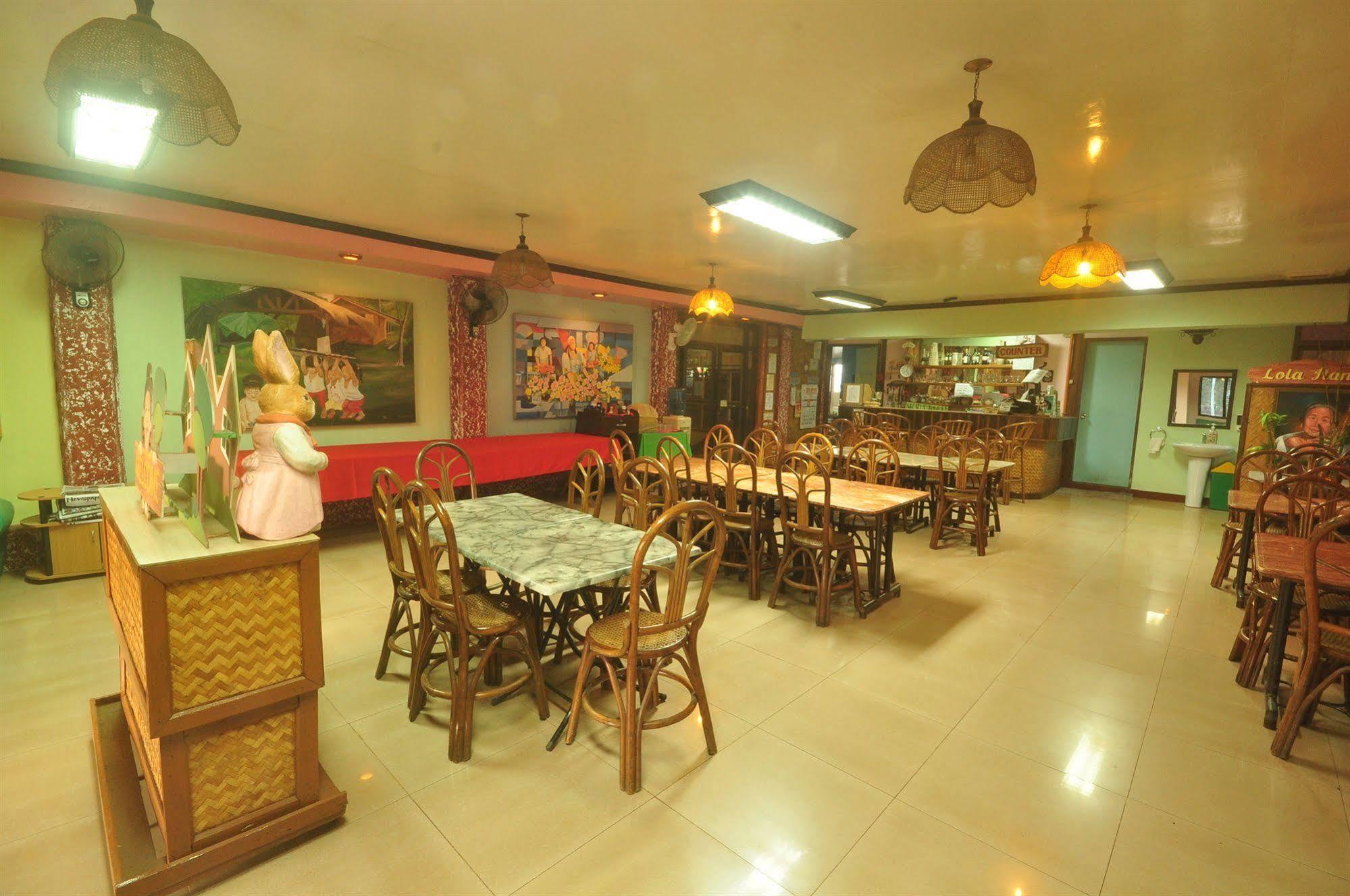 Lola Itang Pension House Tiniguiban Екстер'єр фото